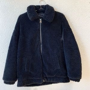 Urban Outfitters black oversized teddy bear jacket.